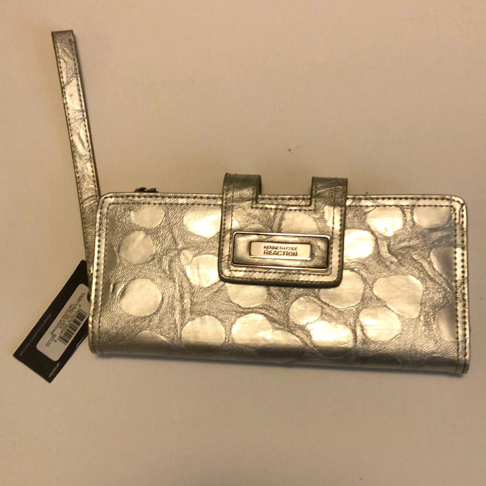 Kenneth Cole silver clutch with strap
